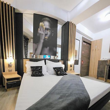 Theline Hotel Bukares Bagian luar foto